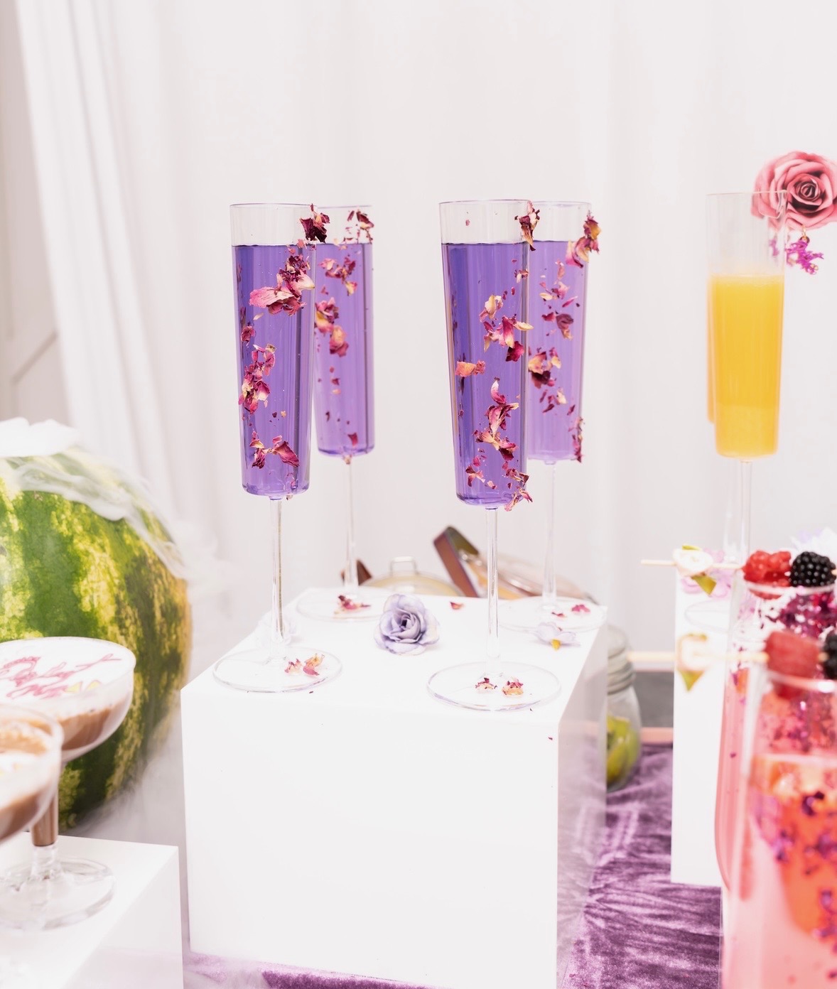 Purple lavender cocktails with rose petals